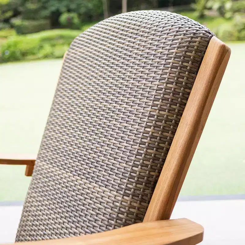 Chaise berçante d'extérieur Sonoma Lane Burke en teck avec assise tressée rembourrée