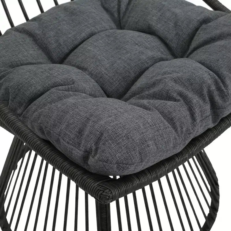 Fauteuil de club d'extérieur en osier bohémien GDFStudio Apulia avec coussins