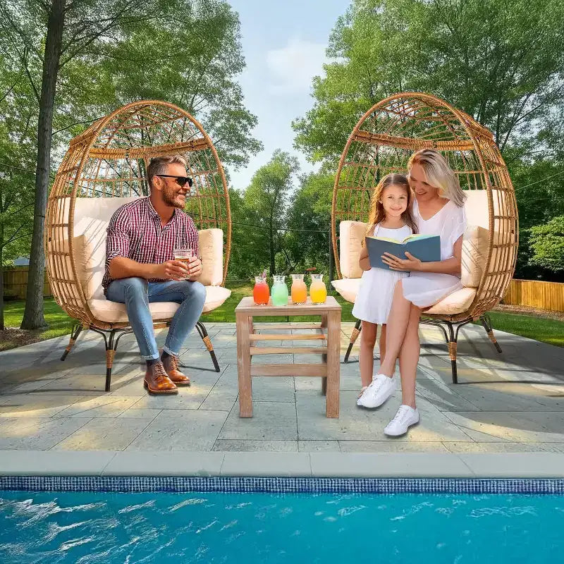 Chaise œuf en osier Chaise de patio en rotin PE avec cadre en acier et coussin ivoire Parfaite pour le jardin, le balcon, le patio et le salon intérieur MAPLE 99