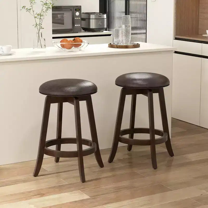Tabourets de bar Costway de 61 cm de haut (lot de 4) avec siège rond pivotant à 360° et repose-pieds