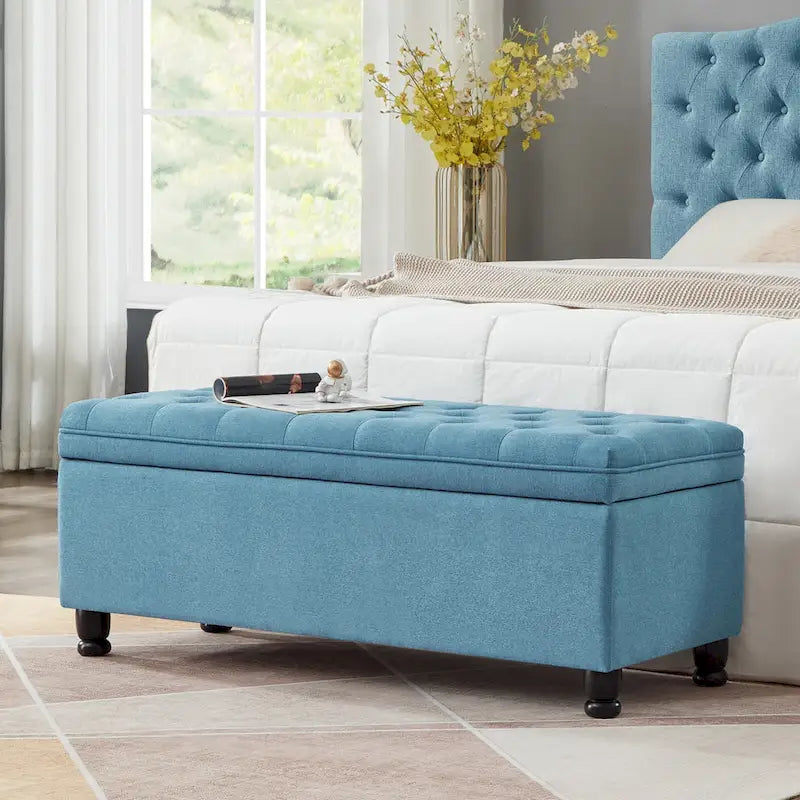 Banc de rangement capitonné en tissu de lin avec pieds fuselés en bois