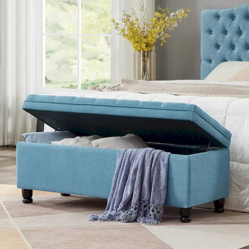 Banc de rangement capitonné en tissu de lin avec pieds fuselés en bois