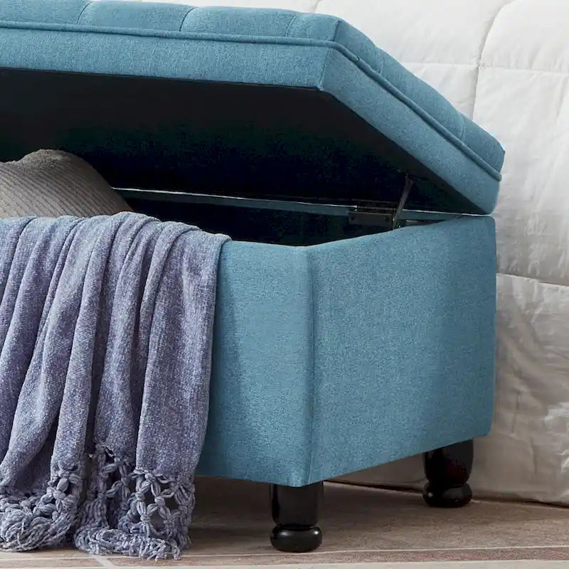 Banc de rangement capitonné en tissu de lin avec pieds fuselés en bois