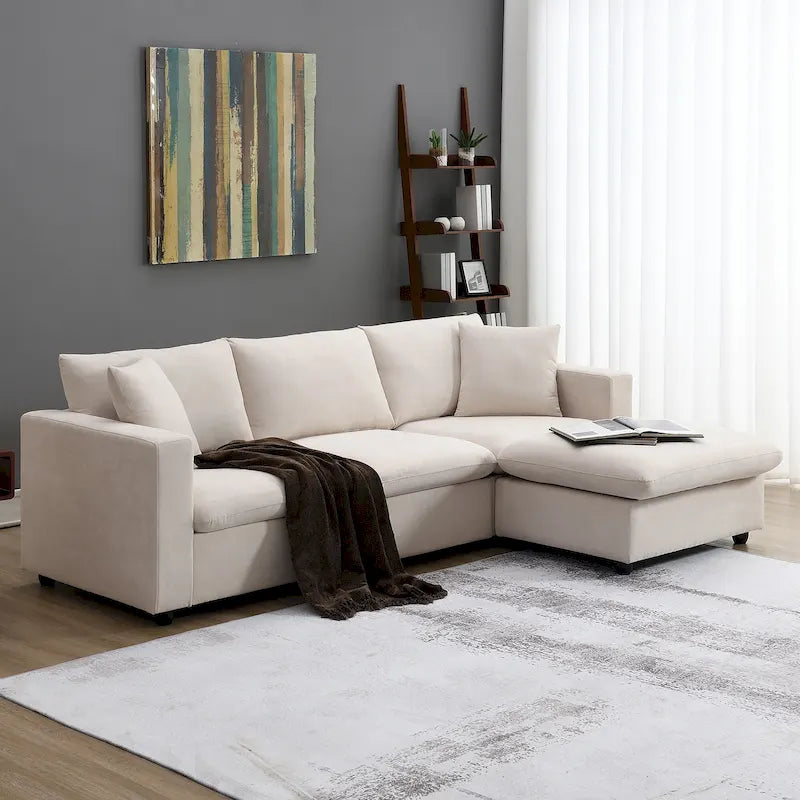 Canapé en tissu polyester en forme de L avec 2 coussins offerts et pouf convertible