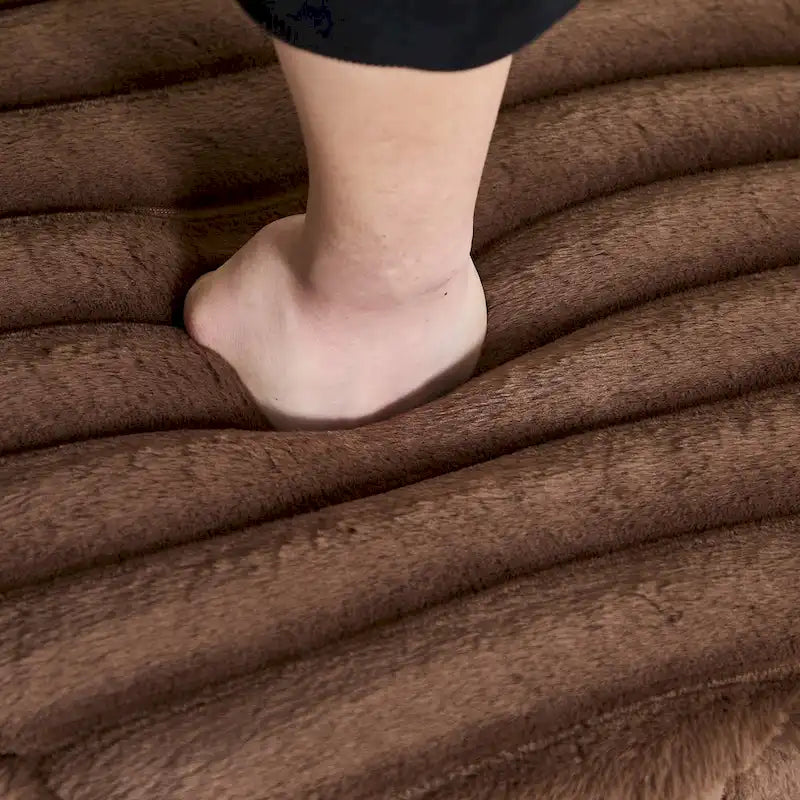 Repose-pieds pouf rond capitonné large 22.05 avec pieds en métal noir