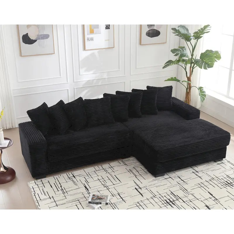 Canapé d'angle en velours côtelé noir 111 avec grande méridienne à droite et 8 coussins décoratifs