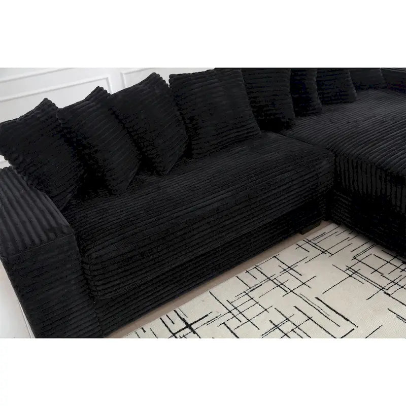 Canapé d'angle en velours côtelé noir 111 avec grande méridienne à droite et 8 coussins décoratifs