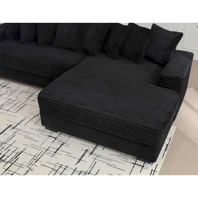 Canapé d'angle en velours côtelé noir 111 avec grande méridienne à droite et 8 coussins décoratifs