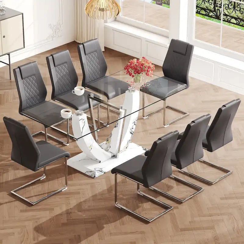 Ensemble de salle à manger moderne avec table en verre trempé, piètement en U à motif marbre et chaises rembourrées en similicuir.