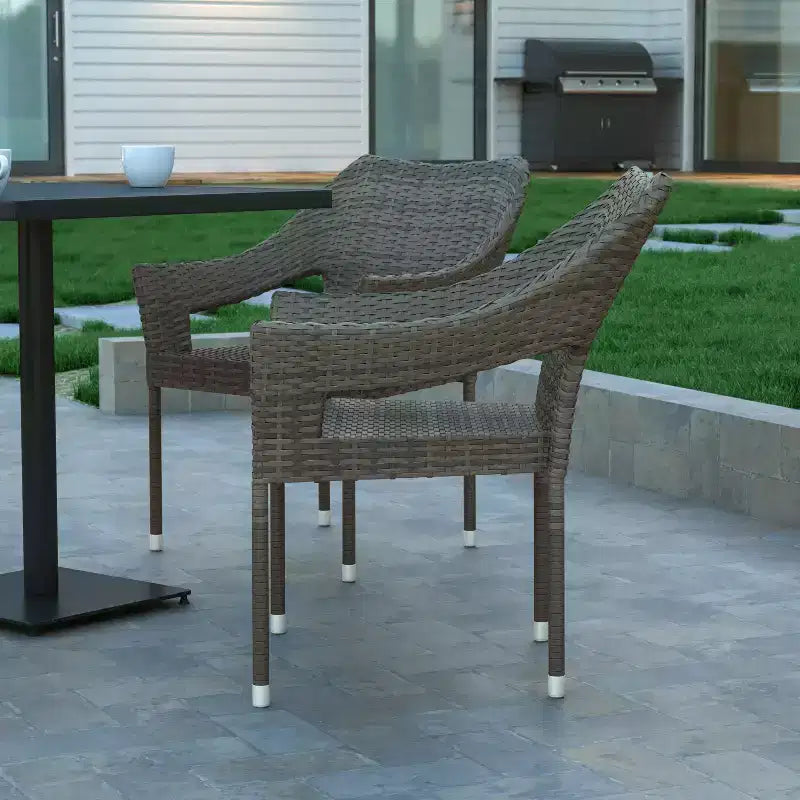 Chaise de salle à manger empilable Emma et Oliver pour l'intérieur et l'extérieur, avec structure en acier et rotin PE résistant aux intempéries