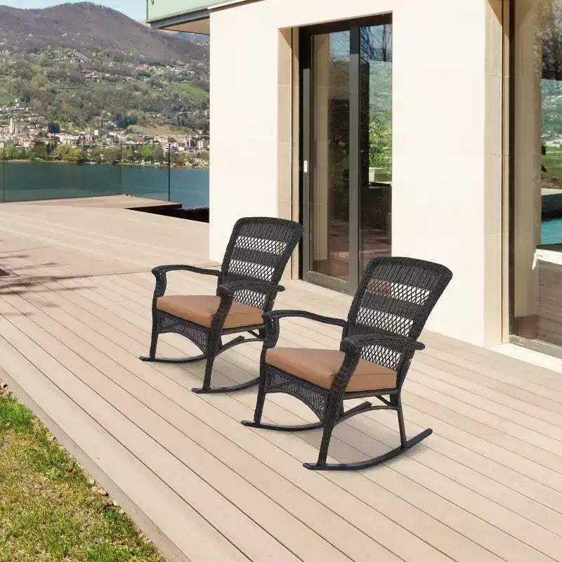Fauteuil à bascule Northlight 42 en osier de résine brun foncé avec coussin