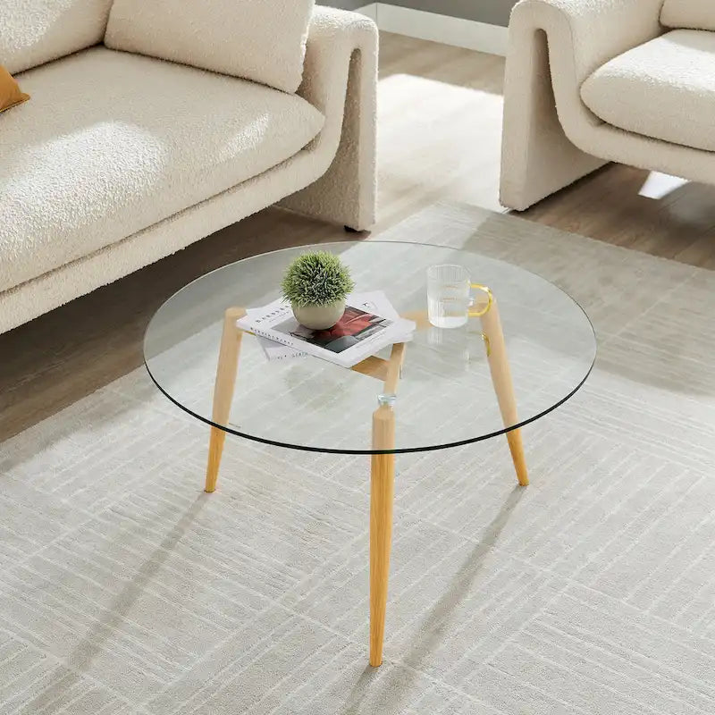 Table basse Danya B. Van Beuren avec pieds fuselés et plateau en verre