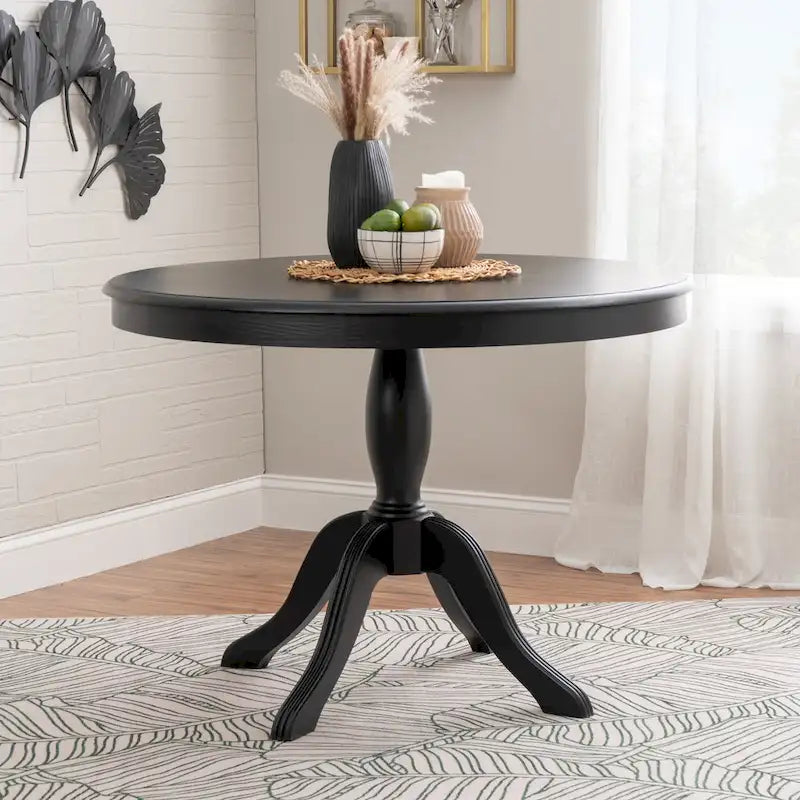 Table ronde à pied central en bois massif